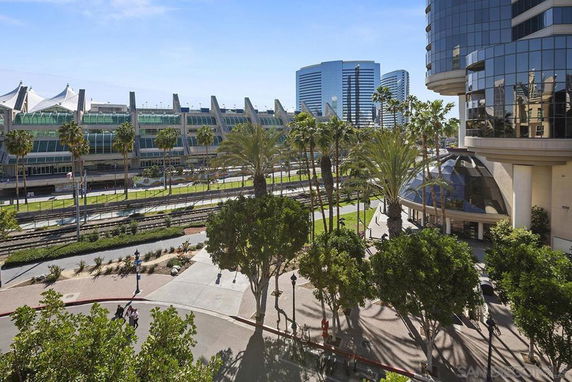 Urban view with modern buildings and greenery.