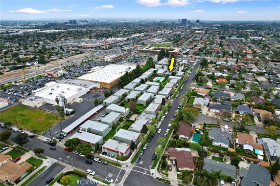 Panoramic view of a residential neighborhood and commercial area.