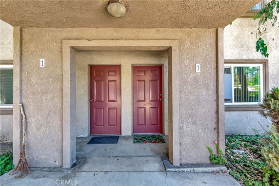 Front view of a building entry with two doors labeled 1 and 3.