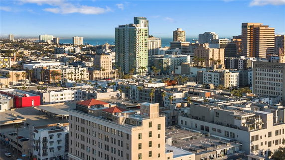 Panoramic view of a cityscape with multiple buildings.