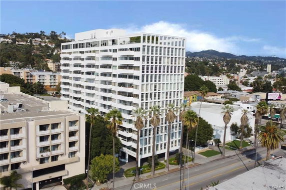 Front view of a multi-story apartment building.