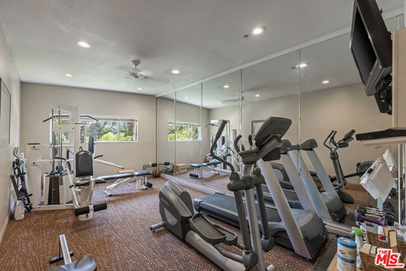 Indoor gym area with treadmills and exercise equipment