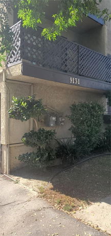 View of a building with a balcony and unit number 9131.