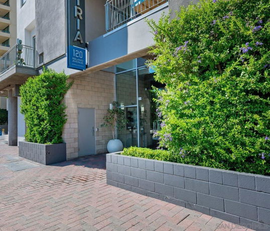 Front view of a building entrance with modern design.