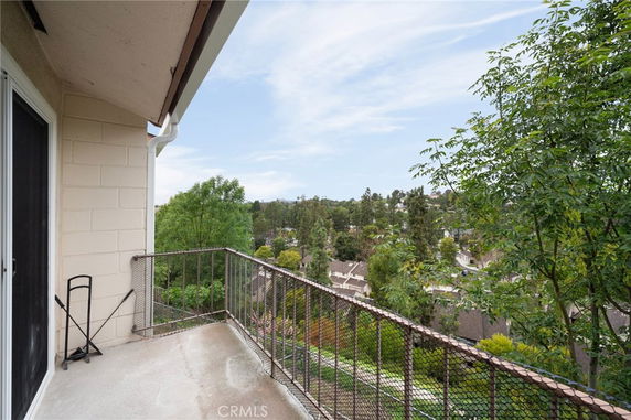 Panoramic view of surrounding area seen from a balcony.