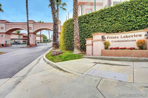 Entrance of Pointe Lakeview Condominiums with arched gateways.