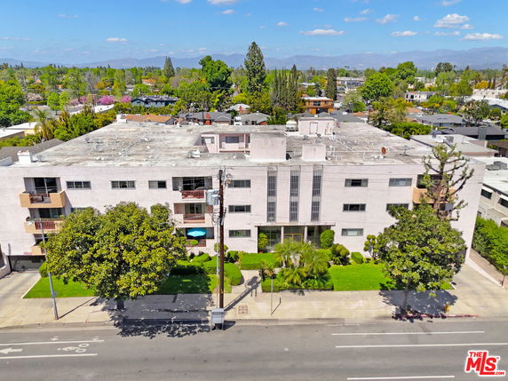 Front view of a multi-story apartment building.