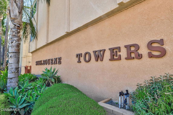 Front view of a building with 'Shelbourne Towers' signage.