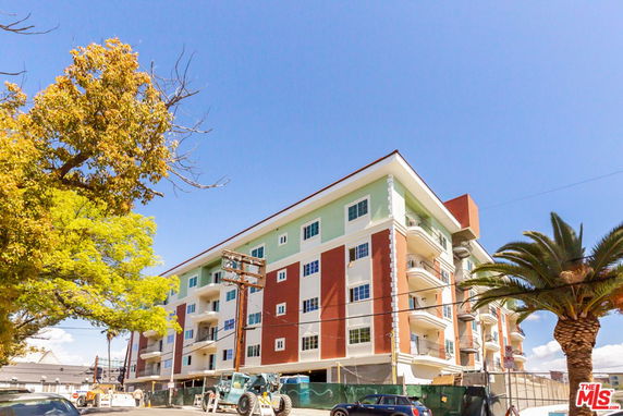 Front view of a multi-story residential building.