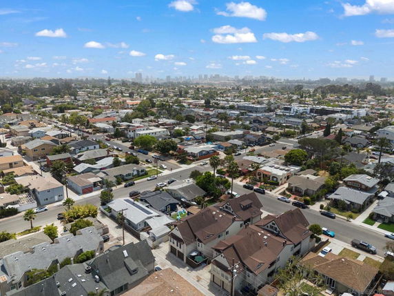 Wide angle view of suburban residential area with various houses.