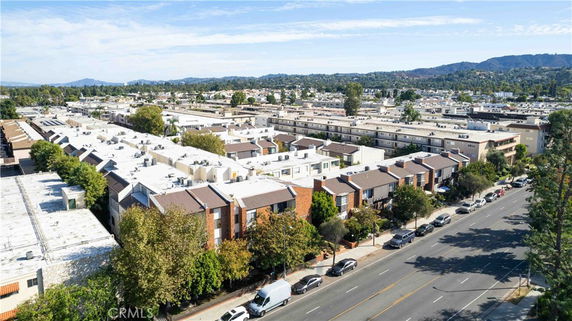 View of a residential area with multiple buildings seen from above