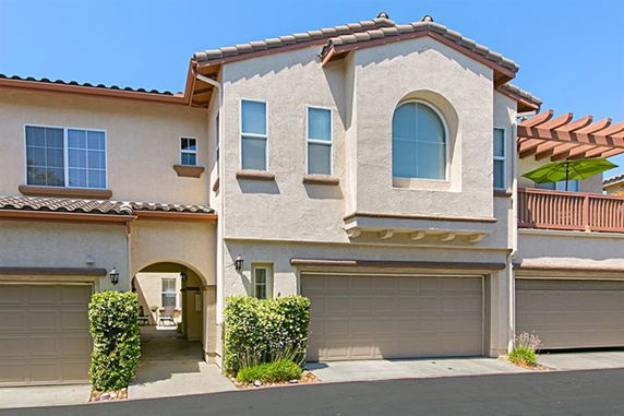 Front view of a two-story house with a two-car garage.