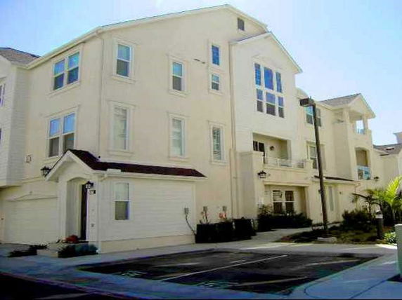 Front view of a multi-story residential building.