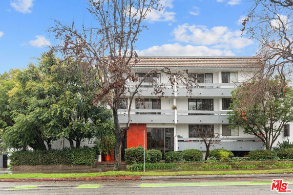 Front view of a multi-story residential building.