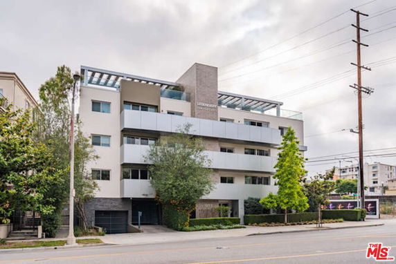 Front view of a multi-story modern apartment building