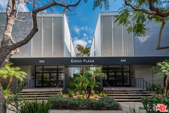 Front view of a building complex named Kings Plaza with entrances labeled 850 and 848.