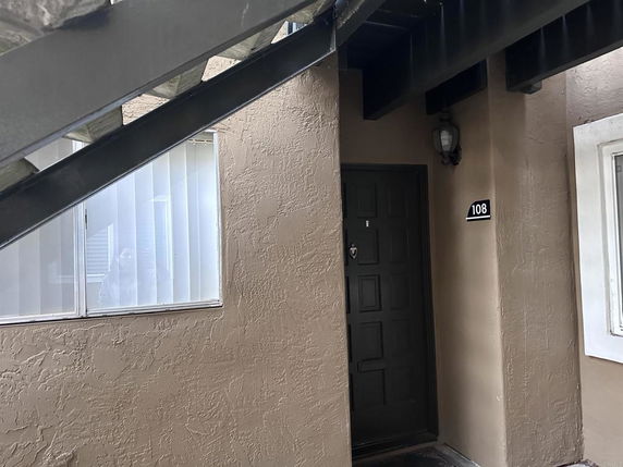 Entrance view of an apartment with unit number 108.