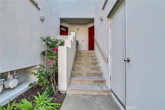 Entrance view with steps leading to a door in a building
