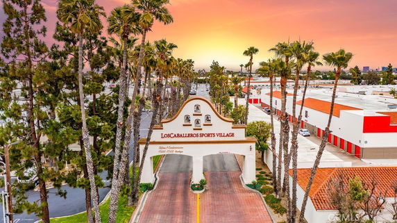 Front view of Los Caballeros Sports Village entrance gate.