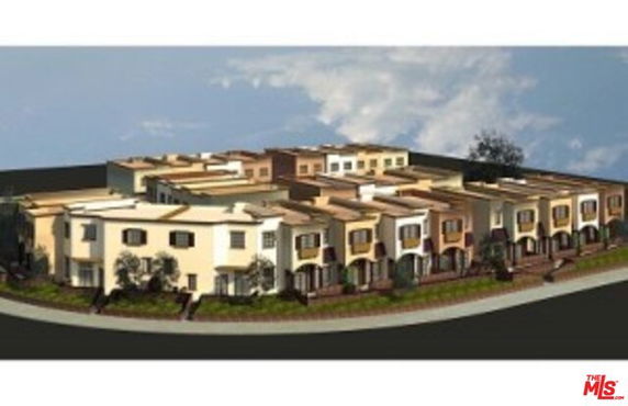Front view of multiple attached townhouses in a row.