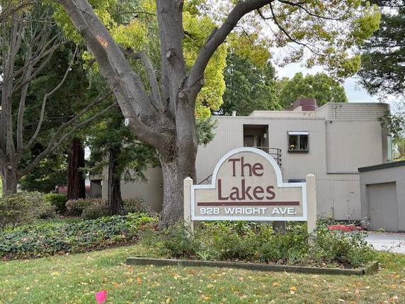 Front view of a building with a sign reading 'The Lakes 928 Wright Ave.'
