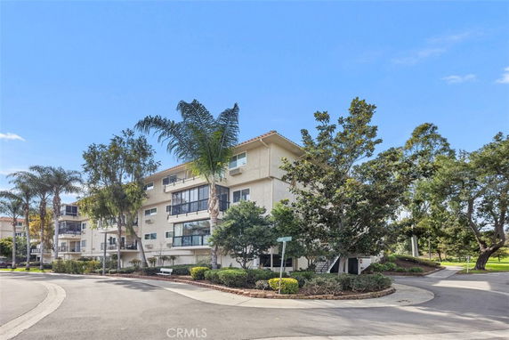 Front view of a multi-story residential building.