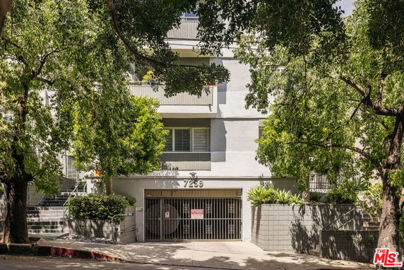Front view of a multi-story residential building.