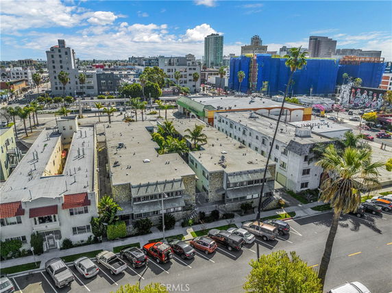 Aerial view of a residential area with multiple apartment buildings and surrounding streets.