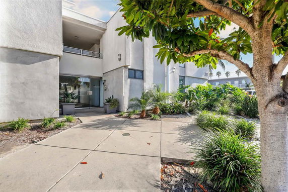 Front entrance view of a modern multi-story building.