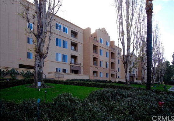 Front view of a multi-story apartment building.