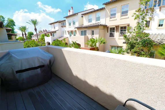 View of surrounding residential buildings from a balcony.
