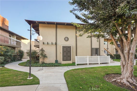 Front view of a multi-story residential building.