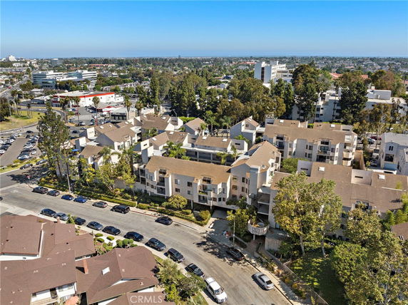 Panoramic view of a residential neighborhood with multiple apartment buildings and surrounding areas.