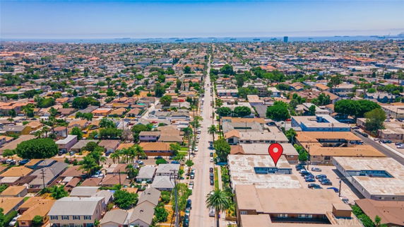 Panoramic view of a residential neighborhood with a focus on rooftops.