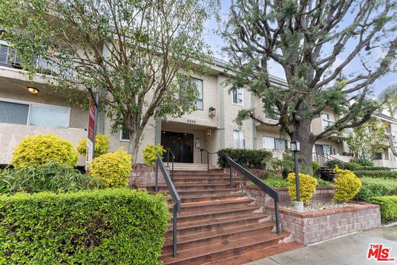 Front view of a multi-story residential building.