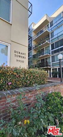 Front view of a multi-story building named Durant Towers.