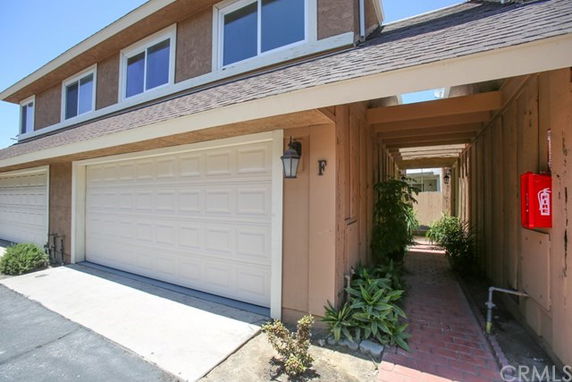 Front view of a two-story house with a double garage.
