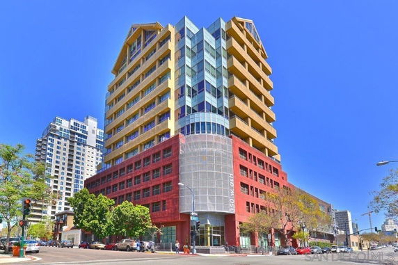 Front view of a multi-story building with a modern design.