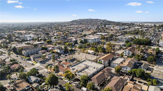Panoramic view of a residential area with houses and buildings.