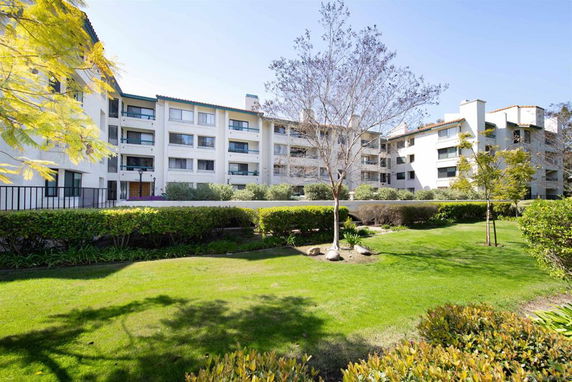 Front view of a multi-story apartment building.