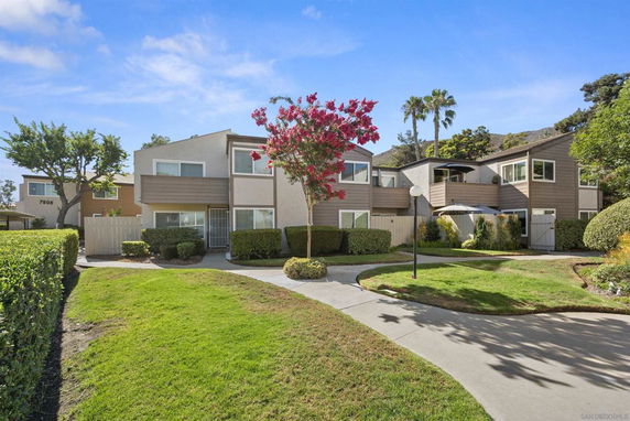 Front view of a two-story residential building with modern design.