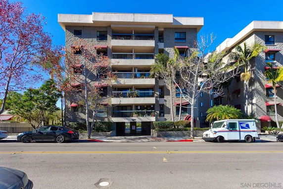 Front view of a multi-story residential building.