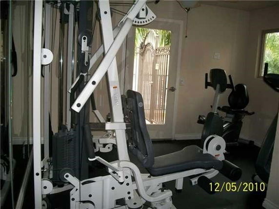 Indoor gym with exercise equipment.