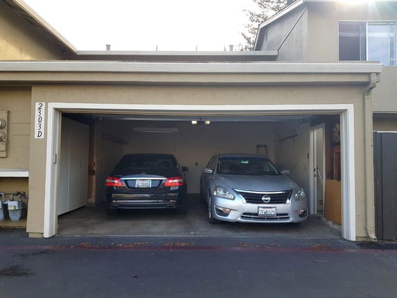 Front view of a house with a two-car garage.