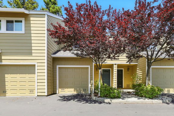 Front view of a two-story house with garage.
