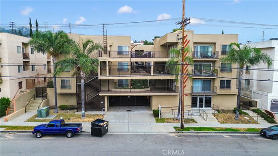 Front view of a multi-story residential building.
