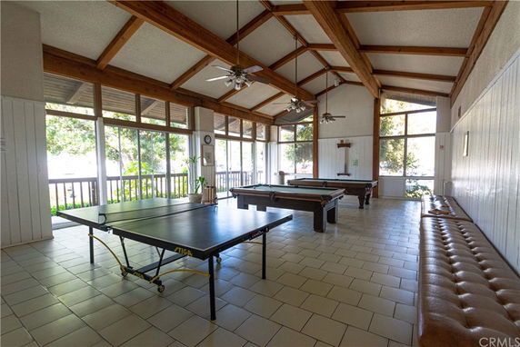 Recreation area with ping pong and pool tables.