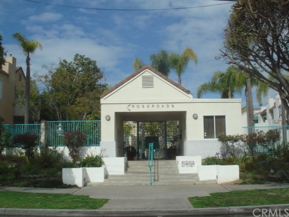 Front view of a building entrance with the name 'CROSSROADS' above.