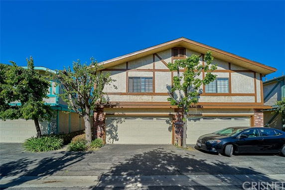 Front view of a two-story house with a double garage.