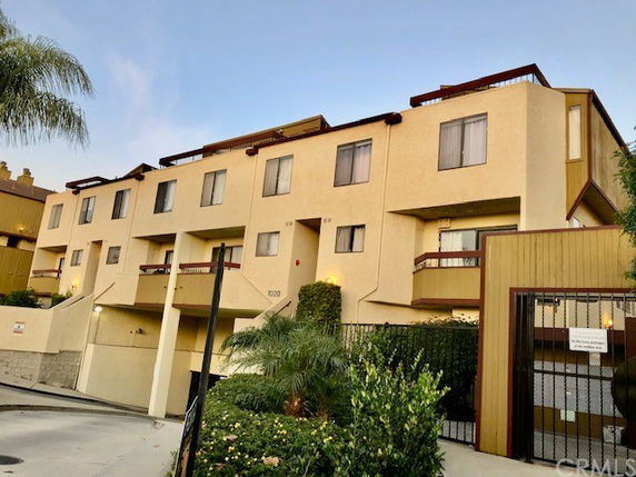 Front view of a multi-story residential building.